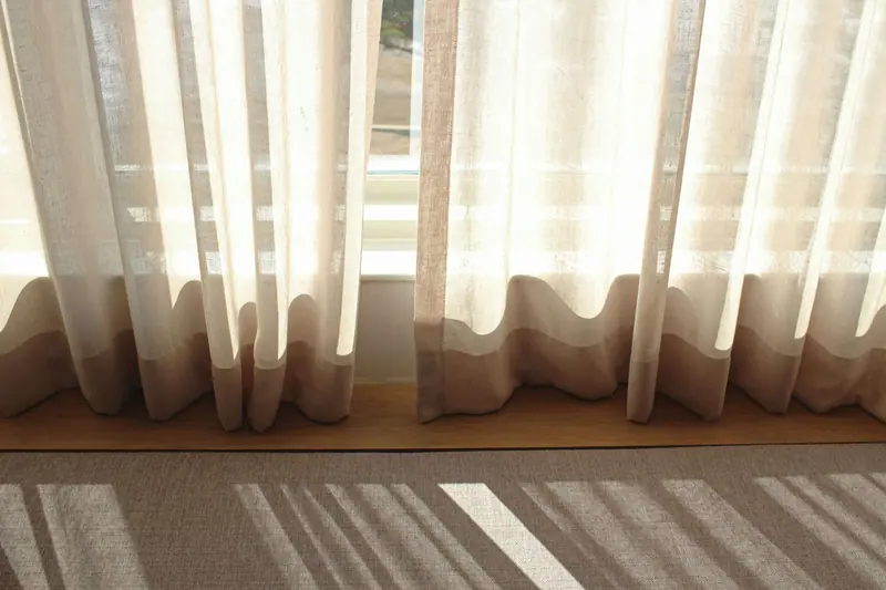 Sheer linen curtains glowing in afternoon sunlight